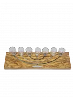A wooden seven-candle holder with a large menorah painted on it